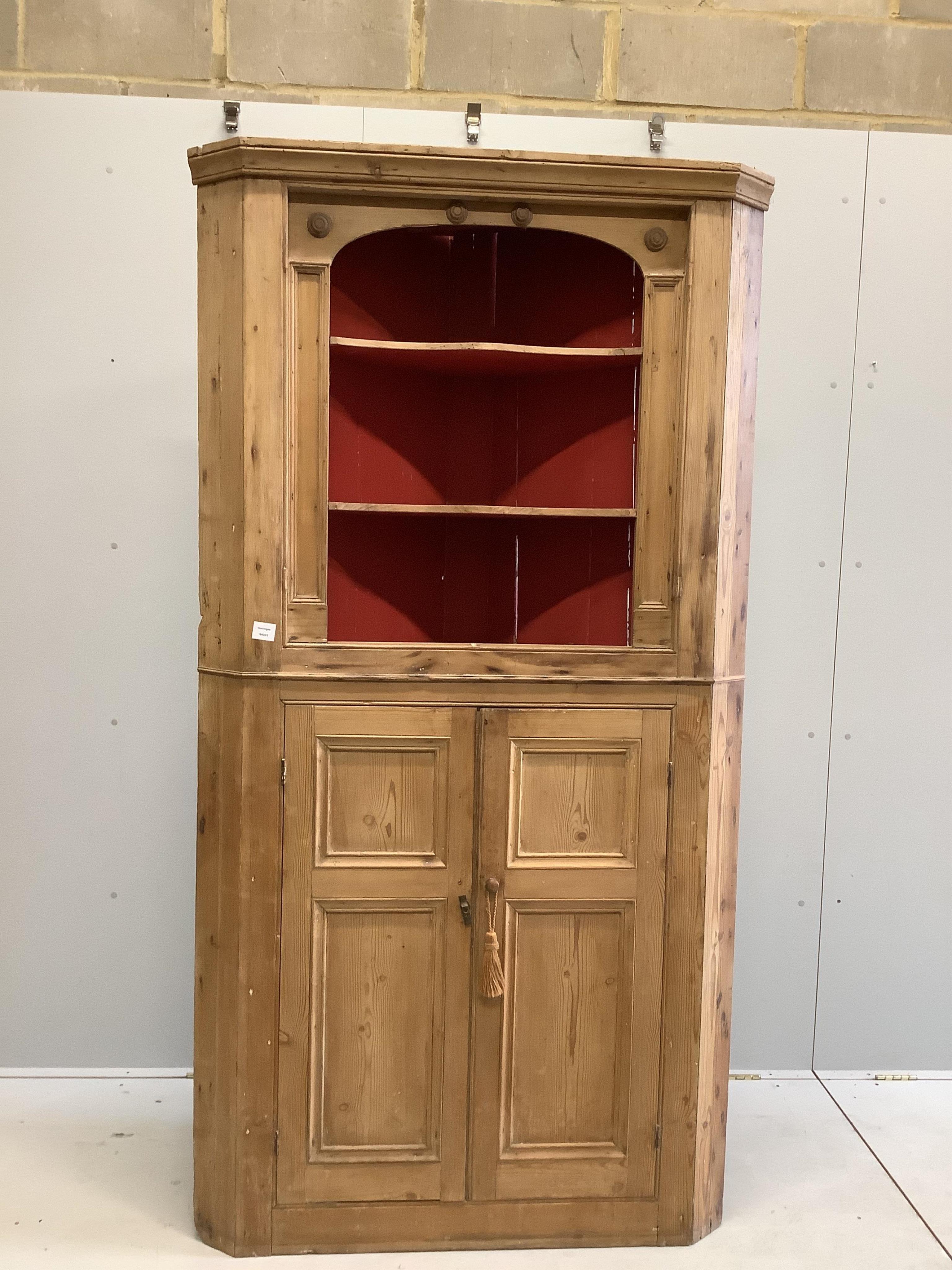 A George III pine standing corner cupboard, width 108cm, depth 40cm, height 205cm. Condition - fair